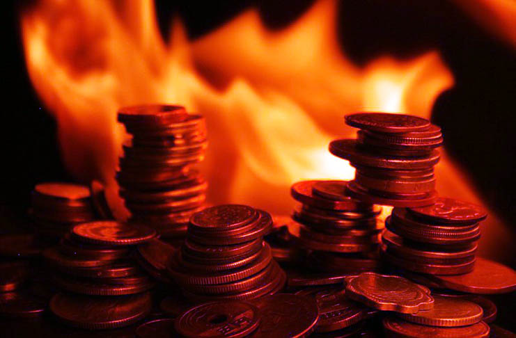 What is token burning and how does the crypto space benefit from it?